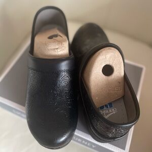 Dansko LT Black Floral Clogs